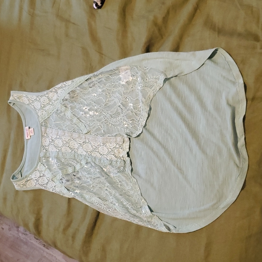 Mossimo see through lace high low tank top. Size Medium color ligh turquoise